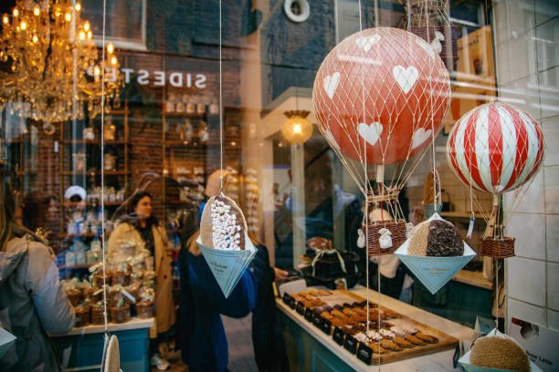 Street view of the Van Wonderen shop window of a famous and traditional Dutch Stroopwafels dessert shop in Amsterdam, Netherlands